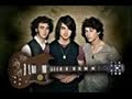 Staring : Joe Jonas, Nick and Kevin Lyrics Joe: Dude, they're totally lookin' at me. Kevin: Joe, they're not lookin' at you. Joe: She looked over at me again. Kevin: No, she didn't Joe. 