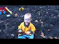 Toddler playing in the mud Toddler playing in the mud