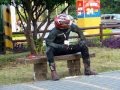 Eating McDonald's food....the true biker way.
