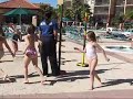 Morgan and Nathan do the limbo at the pool