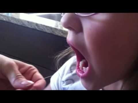 TOOTH!! - When Ellie gets a loose tooth, she likes to get right down to business by asking me to pull it out with a string! Everything is exciting to Ellie. She's so d...