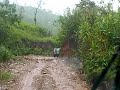 Land Rover Discovery entering Somsak Mining forest glade