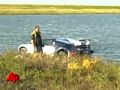 Raw Video: Million Dollar Car Drives Into Lagoon