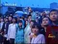 伟大祖国58周岁华诞 12万群众冒雨在天安门广场观看升国旗仪式