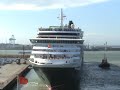 The QE2 thrashes the Queen Victoria in a horn blowing contest at Zeebrugge on 19th July 2008.