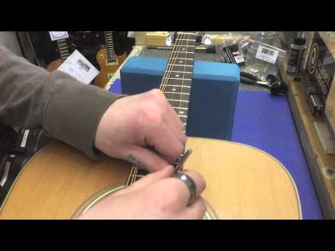 how to adjust the neck on an acoustic guitar
