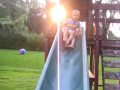 Camila and Miles on the slide