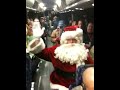 Santa Claus boards the bus