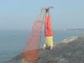 Soorya Raviji - yoga master in Fish and Headstand form.