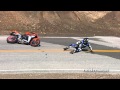 Rider Hits Wet Center Line and Crashes