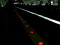 on march 17, i happened upon metro's first test of the red led lighting on the upper level of gallery pl-chinatown station.  unlike its orange counterpart, this ended up being deployed all over the system.  personally, i can stand the red lighting replacing the earlier white lighting, but i find that the red lighting, when flashing, does not differentiate enough between dark and light.  with the leds, to make them most noticeable when flashing, they should go completely to black, rather than just a slightly darker red.