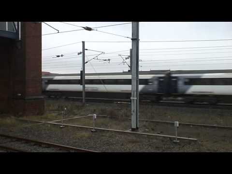 43290 and 43206 race past Darlington