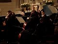 maestro joseph lliso conducts the pan american symphony orchestra at the blessed sacrament church in new york city.