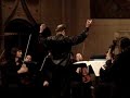 maestro joseph lliso conducts the pan american symphony orchestra at the blessed sacrament church in new york city.