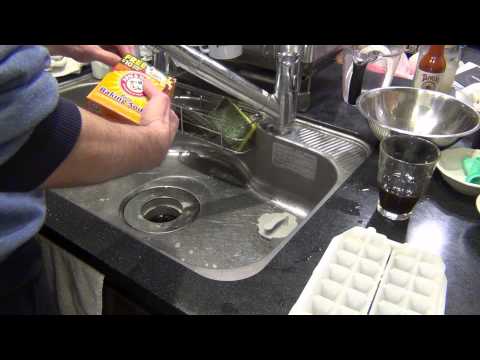 how to empty a sink disposal