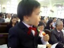 Ring bearer Hayes sang Give Thanks.AVI