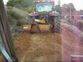 Dad grading the new driveway