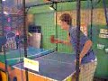 this is me playing a ping-pong game in an arcade in japan