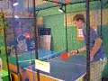 this is me playing a ping-pong game in an arcade in japan