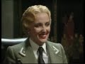 First aired: 12/24/1988Having escaped from the hospital, René is left making his way back to the cafe in a hospital gown, which opens up the back. Gruber unexpectedly arrives and - amused by the backless hospital gown - informs him Alphonse has been killed by the exploding bedpan. Yvette is happy René is back but as usual Edith catches them in each others arms. The excuse this time is that Yvette is faint from the anaesthetic on the operating gown. Helga is surprised to learn from Herr Flick that the stolen Gestapo money were fake. Meanwhile, Herr Flick figures Alphonse had the money so he sends Von Smallhausen off to Alphonse's mortuary (posing as a corpse). Helga tells Von Strohm that the money are fake so they put them into Bertorelli's pants for him to return to René. However, Von Strohm double-crosses Bertorelli and anonymously calls Herr Flick and says the money are in the pants of a man with feathers in his hat. Michelle has come up with a new 