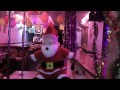 THAI GIRL PLAYING WITH SANTA CLAUS AT THE HONEY BAR IN IN PATTAYA THAILAND