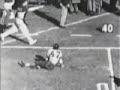 Rice's Dicky Maegle is tackled from the sideline by Alabama's Tommy Lewis in the 1954 Cotton Bowl in one of the most famous plays in college football history.