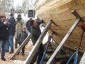 Actor/adventurer Billy Campbell fastens the last plank -- the so-called Shutter Plank -- in the hull of a 48-foot wooden schooner that is being built for him at The Dory Shop in Lunenburg, Nova Scotia, Canada. Built traditionally from an original half-hull design by David Westergard using heavy double-sawn frames, fashioned from Osage Orange, with two steam-bent White Oak frames in between and planked in Alaskan Yellow Cedar, Campbell's schooner and her twin, being built right alongside, will be launched later this year by Dawson Moreland & Associates, builders of the new Lunenburg Schooners.