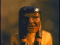 during the long winter night, a boy sets out to carve a man in a canoe. he calls the little man 