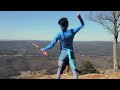 Check out the shorter version: www.youtube.com A local fan of Avatar, and member of the Na'vi People, shows up in their role playing costume to the launch of a hang gliding site to investigate the 