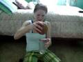 Ashlynn opening a coconut