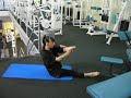A Further Stretch - Barbara Does Her Exercises in Quogue