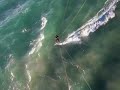 Kiteboarder Almost Hits Pod of Dolphins