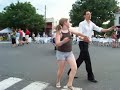 Maddie K and her partner Evan in a lively East coast swing dance at Strawberry Moon Glastonbury 2009