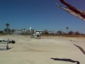 Bush plane landing in Xigera airstrip in Botswana Bush plane landing in Xigera airstrip in Botswana