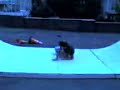 My friend busting his butt on a half pipe