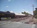 june 11, 2007:  seven trains in one hour proves that this can be a really busy line, this is the first part of the video series, you will see trains 506, 19g, 11j, and 501 in that order, also the construction train (98k) way down.  506, 501, 11j, and 98k made a quadruple meet, 506 waiting back, 11j on one track,  501 waiting for the 11j on two, and the 98k on track three.  impressive action, ironically, 506 was first to arrive, but was last to leave an 50 minutes later. 23m also went when i arrived here, no footage :(.  see part two please, that continues the series.