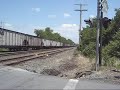 june 11, 2007:  seven trains in one hour proves that this can be a really busy line, this is the first part of the video series, you will see trains 506, 19g, 11j, and 501 in that order, also the construction train (98k) way down.  506, 501, 11j, and 98k made a quadruple meet, 506 waiting back, 11j on one track,  501 waiting for the 11j on two, and the 98k on track three.  impressive action, ironically, 506 was first to arrive, but was last to leave an 50 minutes later. 23m also went when i arrived here, no footage :(.  see part two please, that continues the series.