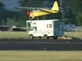 PLANE LANDS ON A MOVING VAN PLANE LANDS ON A MOVING VAN