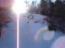 Dax Falling on Skis after good cliff run.
