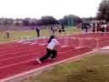 Girl falls over twice doing hurdles