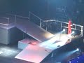 jonas brothers 11/25  joe and nick doing a flip 