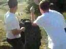 Tractor Tire Rolls Down A Hill And Hits Someone
