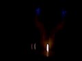 Dr. Micai lighting his hands on fire.