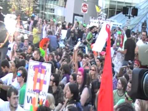 Newsparticipation - Occupy Boston protesters sitting and occupying Dewey Square.