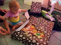 Athena Opening a Present From Grandpa Rodaks 12/25/09