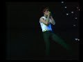 Huey Lewis plays the harmonica like a madman (live) 1984