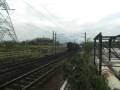 MTR 60 + 58 hauls X908 with a mail coach(UZ 25B 7967) and 3 freight trains leaving Lo Wu Yard
