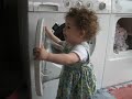 Caroline helps with the laundry