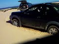 Getting bogged while 4WDing the sand dunes at Stockton Beach Getting bogged while 4WDing the sand dunes at Stockton Beach