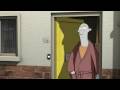 Some grey bloke answers the door